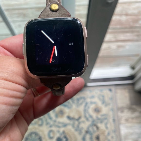 fitbit Other - FitBit Versa with charger Rose Gold color